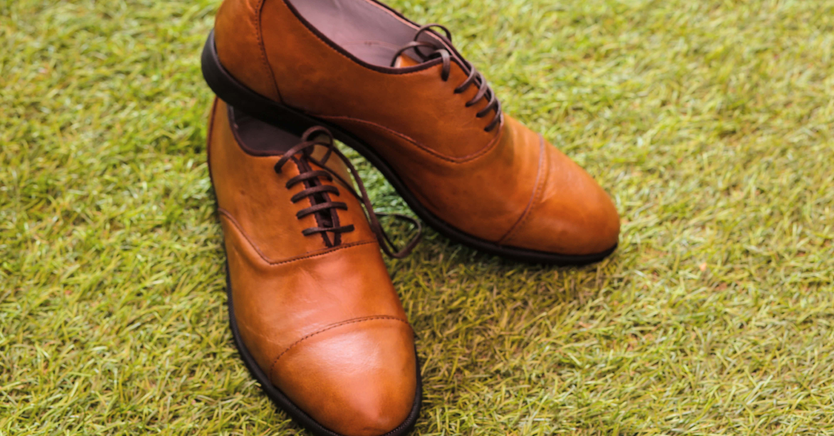 A pair of brown leather shoes.